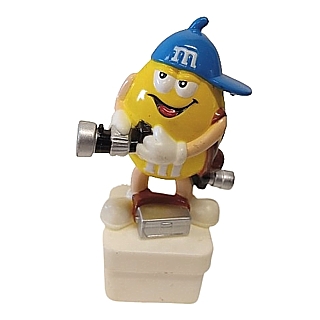 Advertising Collectibles - M & M Yellow Photographer with Camera Square Base Topper